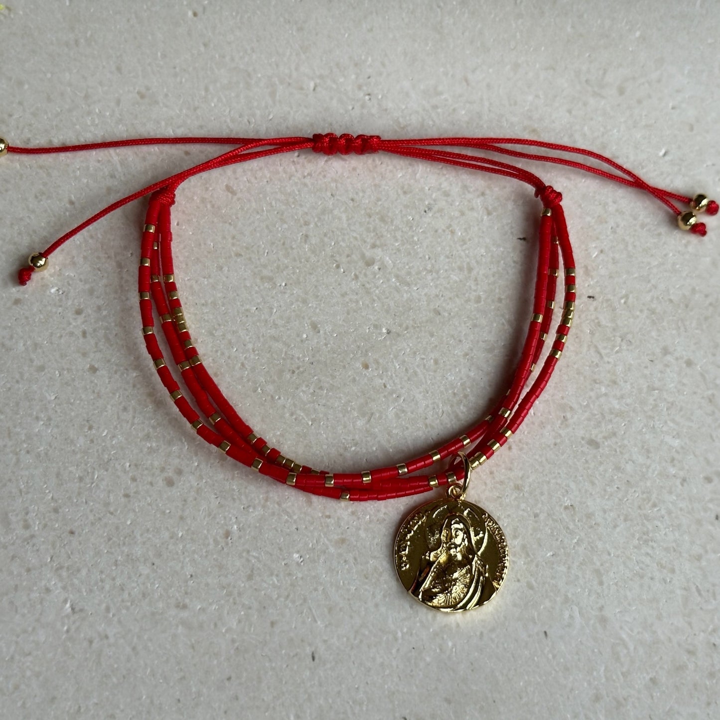 Pulsera protección de miyuki roja/cristo