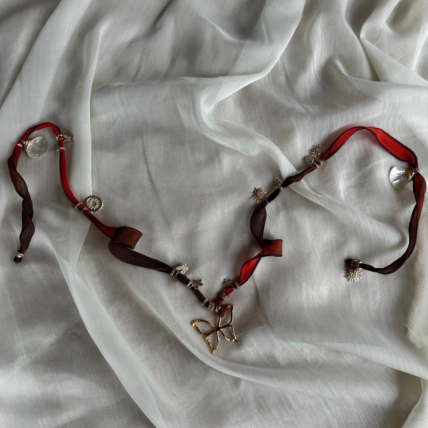 Choker y pulsera de seda Naranjo/café/mariposa