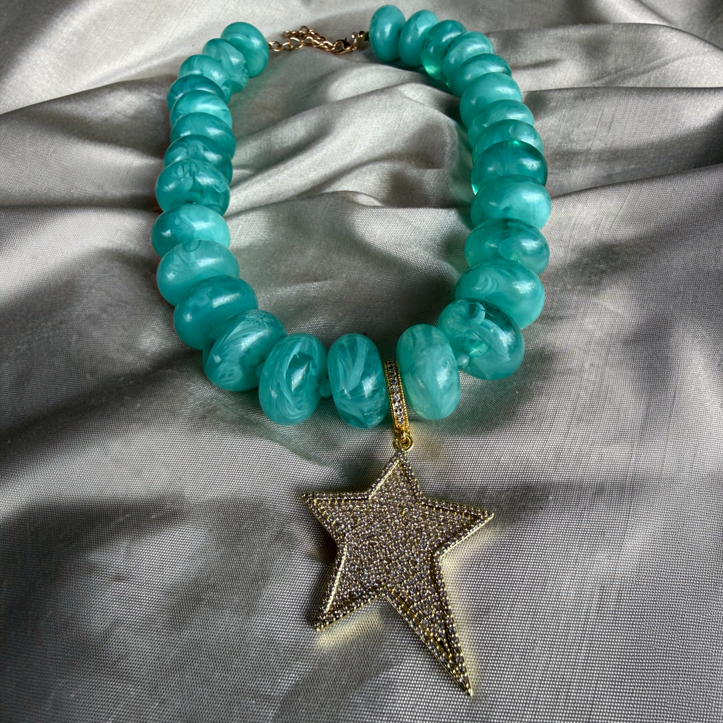 Estrella Verde Agua
