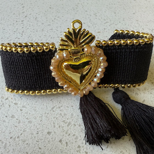 Pulsera corazón tejida negro
