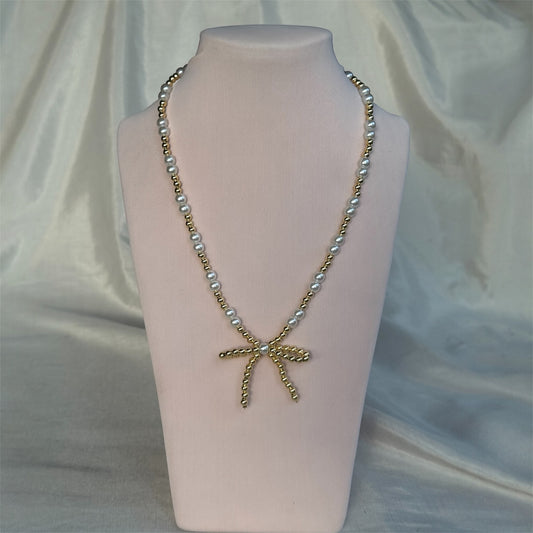 Collar Perlas & Moño Dorado