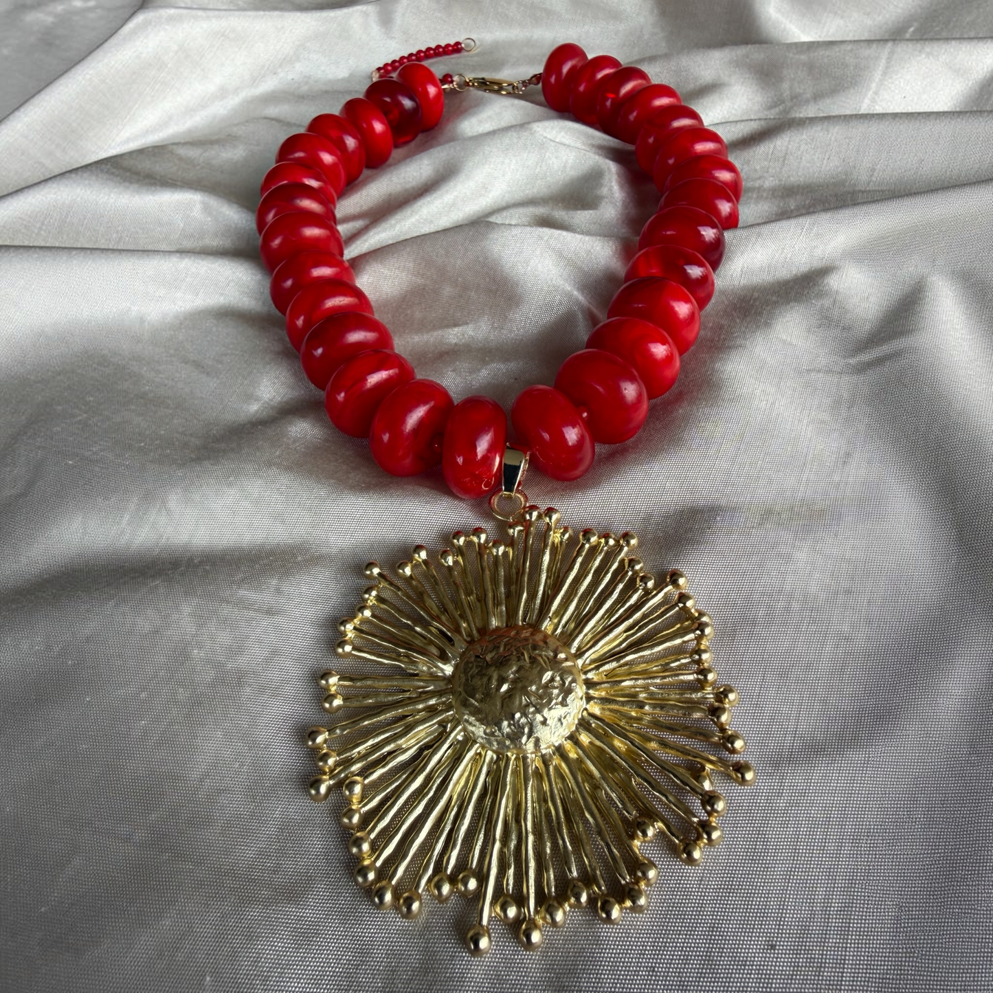 Sol Rojo Dorado